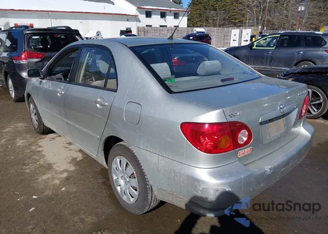 2003 Toyota Corolla Le z USA, uszkodzony, nr VIN JTDBR32E032004096